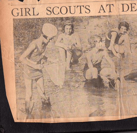 1930s newspaper photo of girl scouts in creek